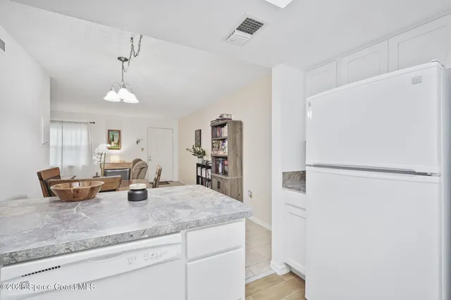 $1,400 | 4133 Cedar Creek Circle, Unit 303, Merritt Island, FL 32953