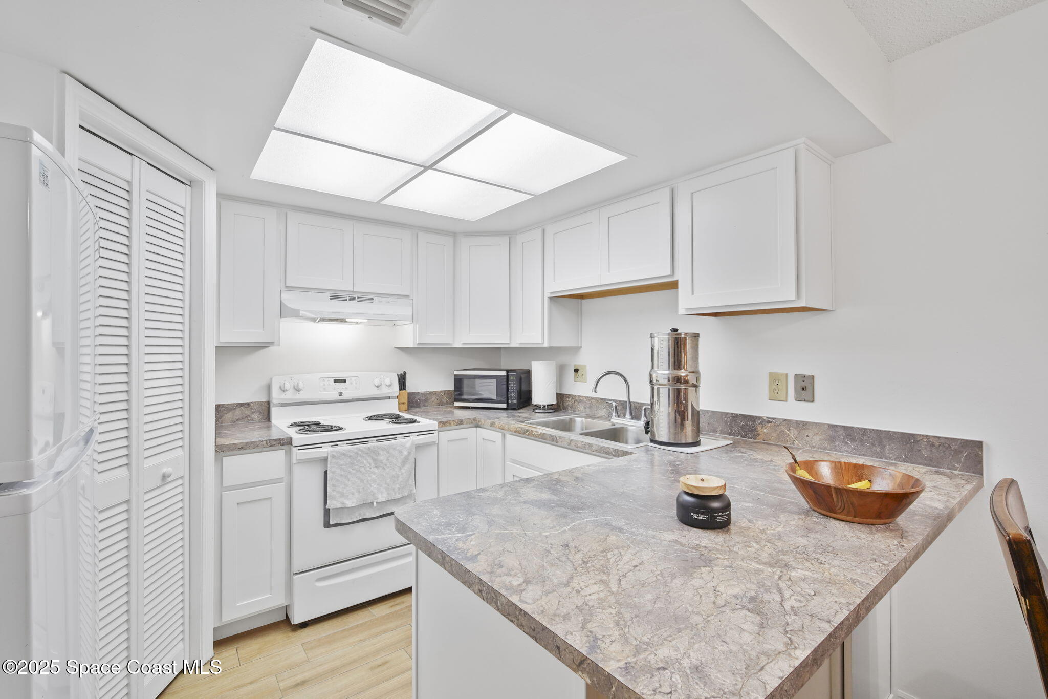 4133 Cedar Creek Circle, Unit 303 Merritt Island, FL 32953 - Photo 12 of 24 7-web-or-mls-CEDAR CREEK_KITCHEN3