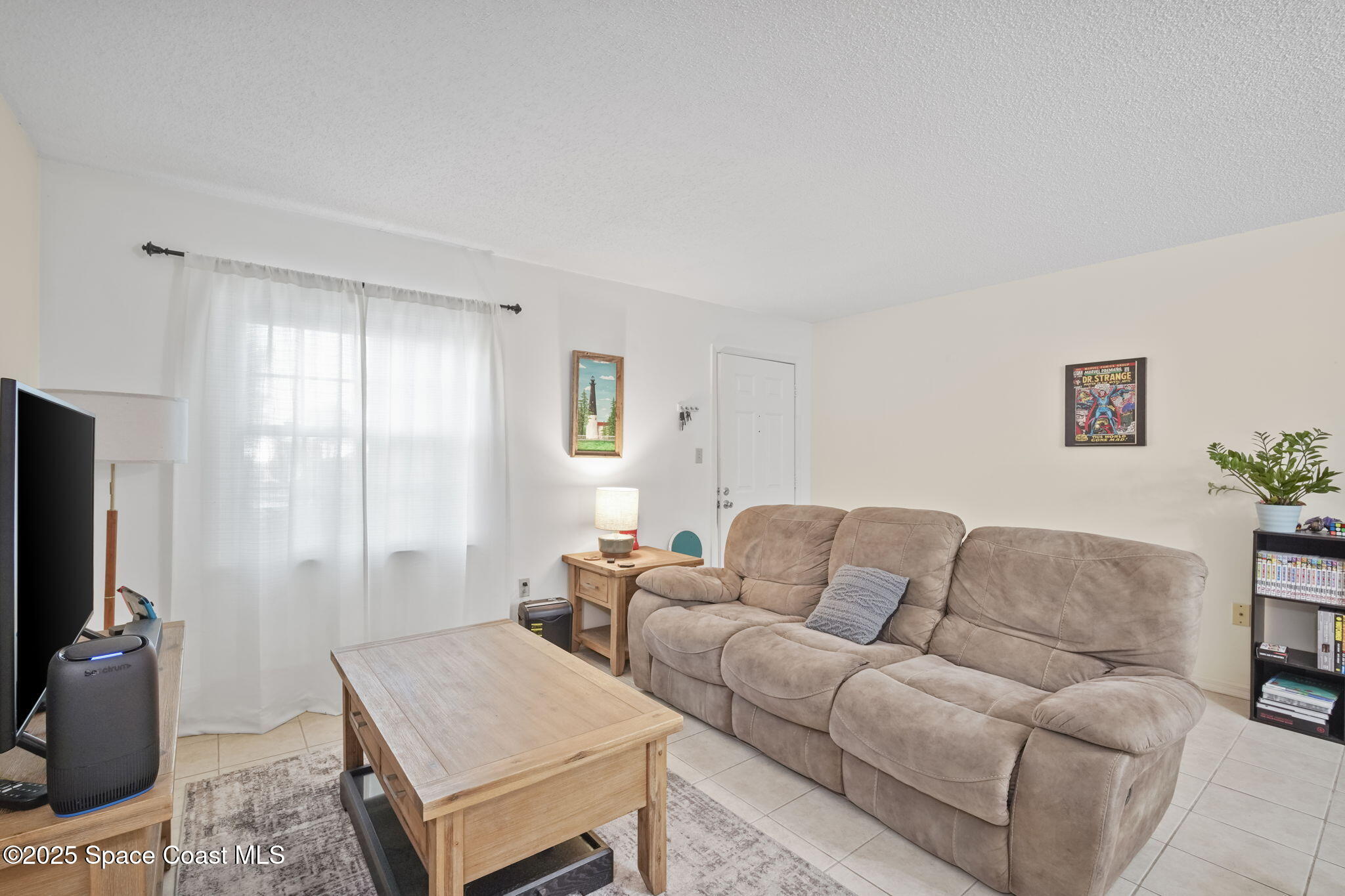 4133 Cedar Creek Circle, Unit 303 Merritt Island, FL 32953 - Photo 7 of 24 6-web-or-mls-CEDAR CREEK_LIVING3