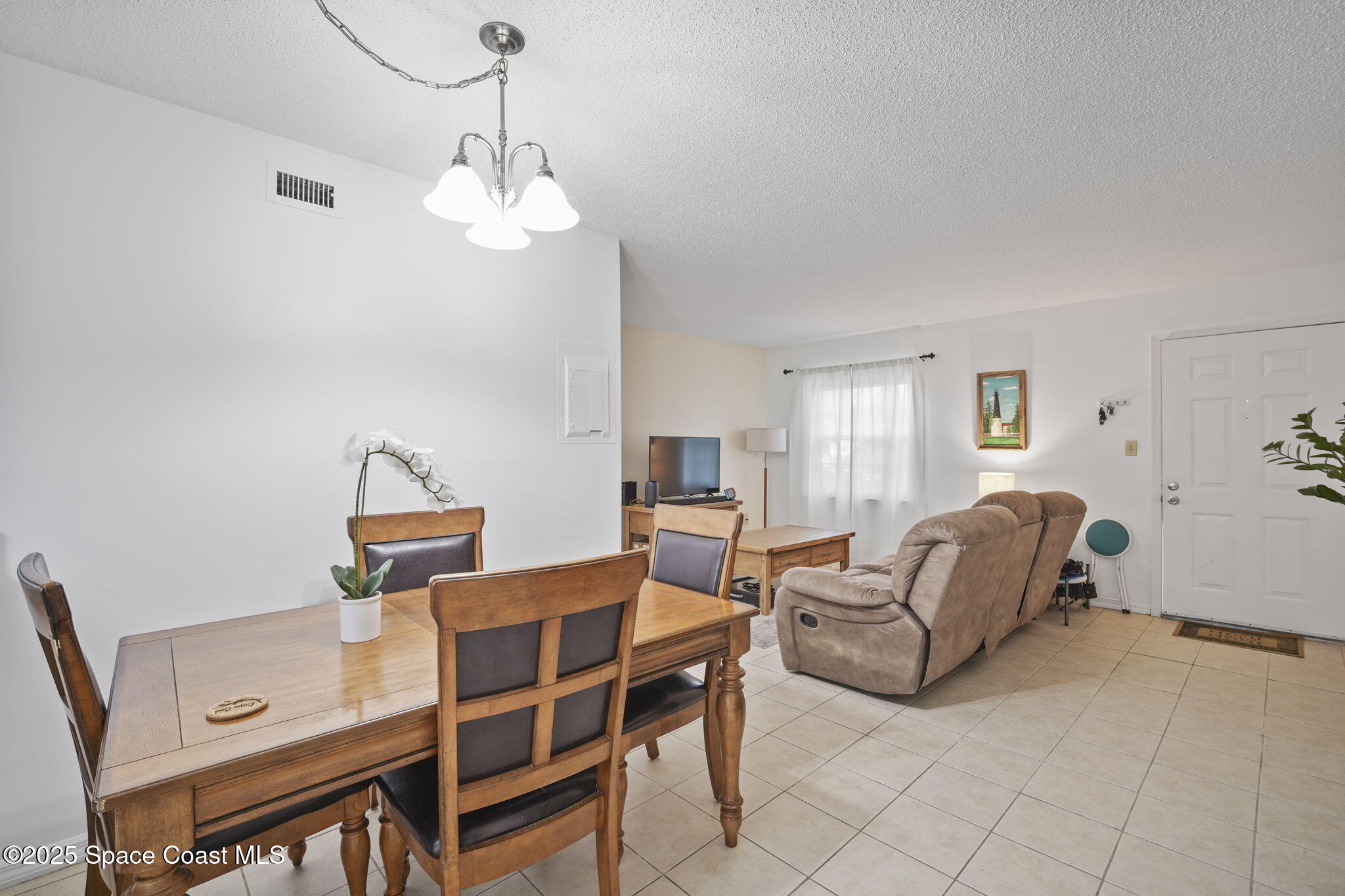 4133 Cedar Creek Circle, Unit 303 Merritt Island, FL 32953 - Photo 8 of 24 10-web-or-mls-CEDAR CREEK_DINING3