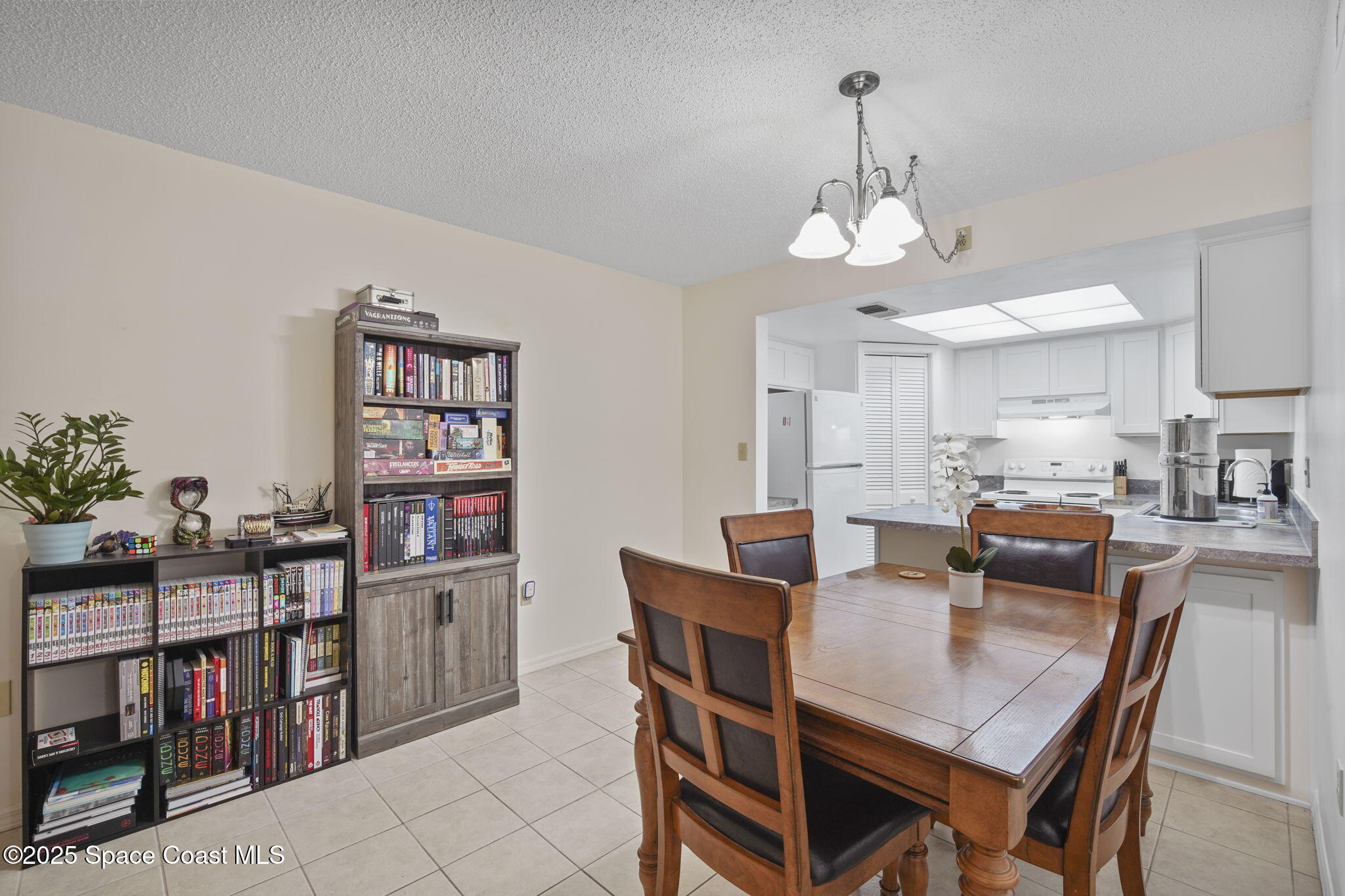 4133 Cedar Creek Circle, Unit 303 Merritt Island, FL 32953 - Photo 9 of 24 11-web-or-mls-CEDAR CREEK_DINING9