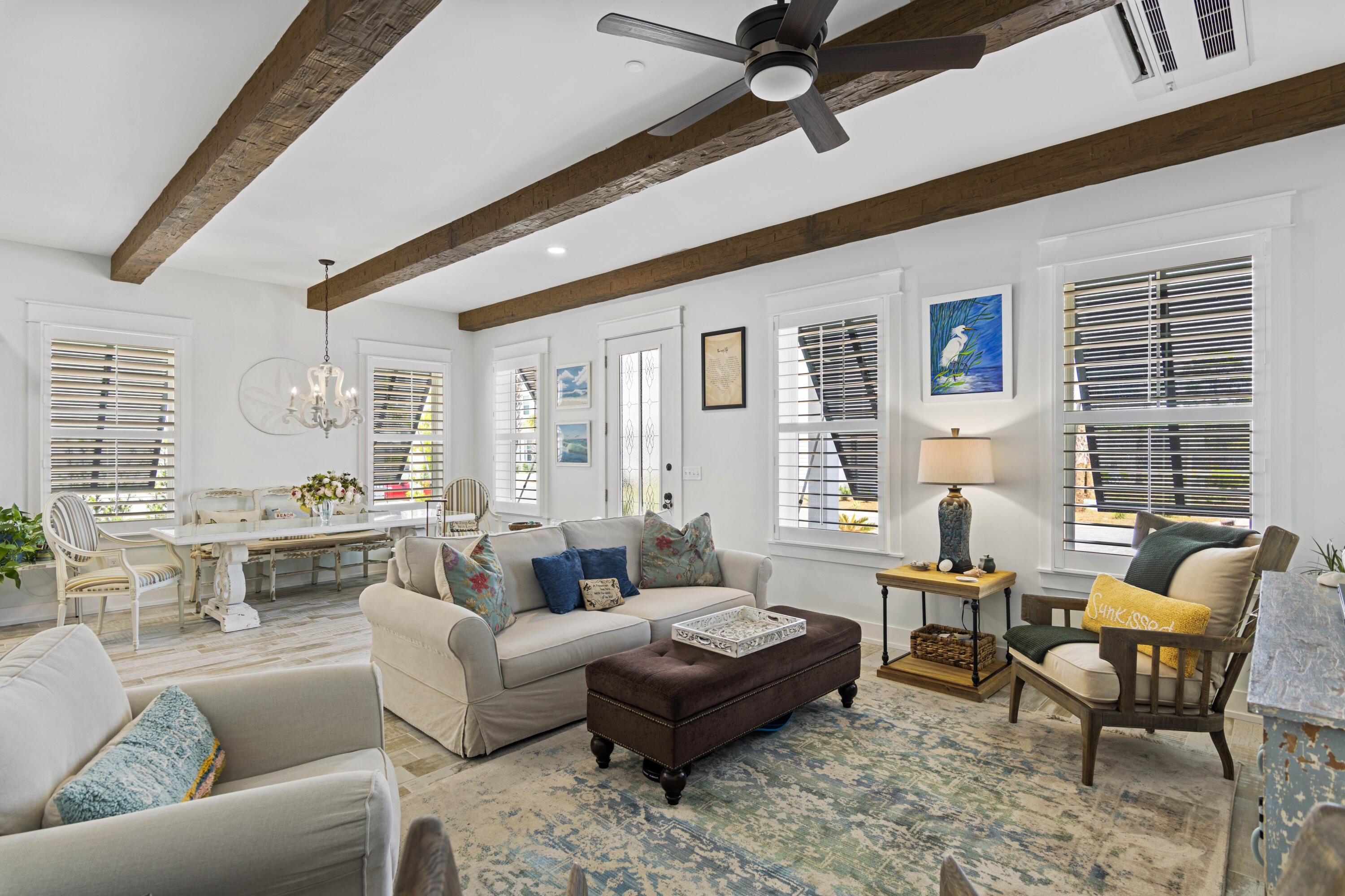 58 Beach View Drive Inlet Beach, FL 32461 - Photo 14 of 47 a living room with furniture wooden floor and a large window