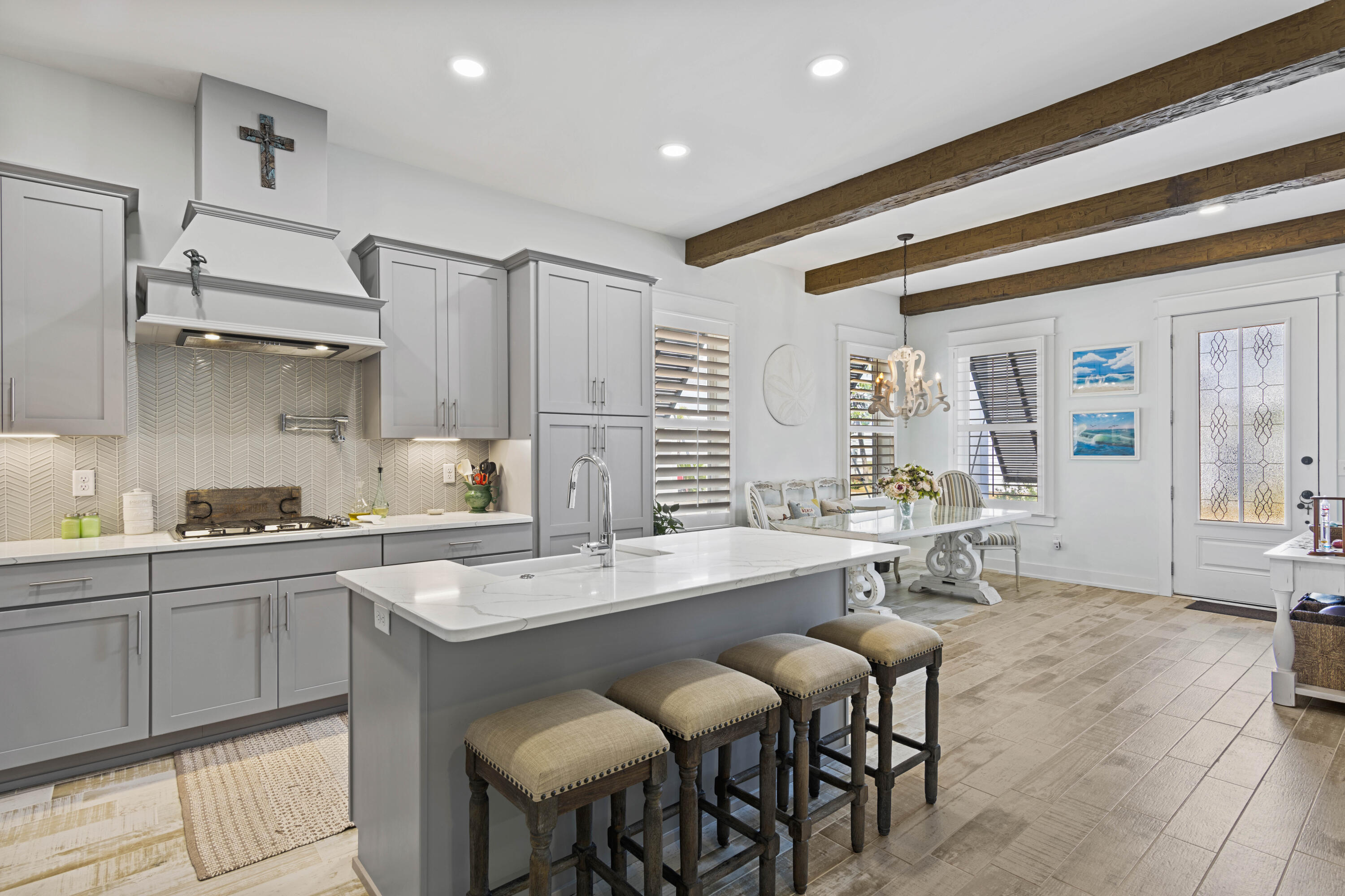 58 Beach View Drive Inlet Beach, FL 32461 - Photo 2 of 47 a kitchen with granite countertop a sink and white cabinets