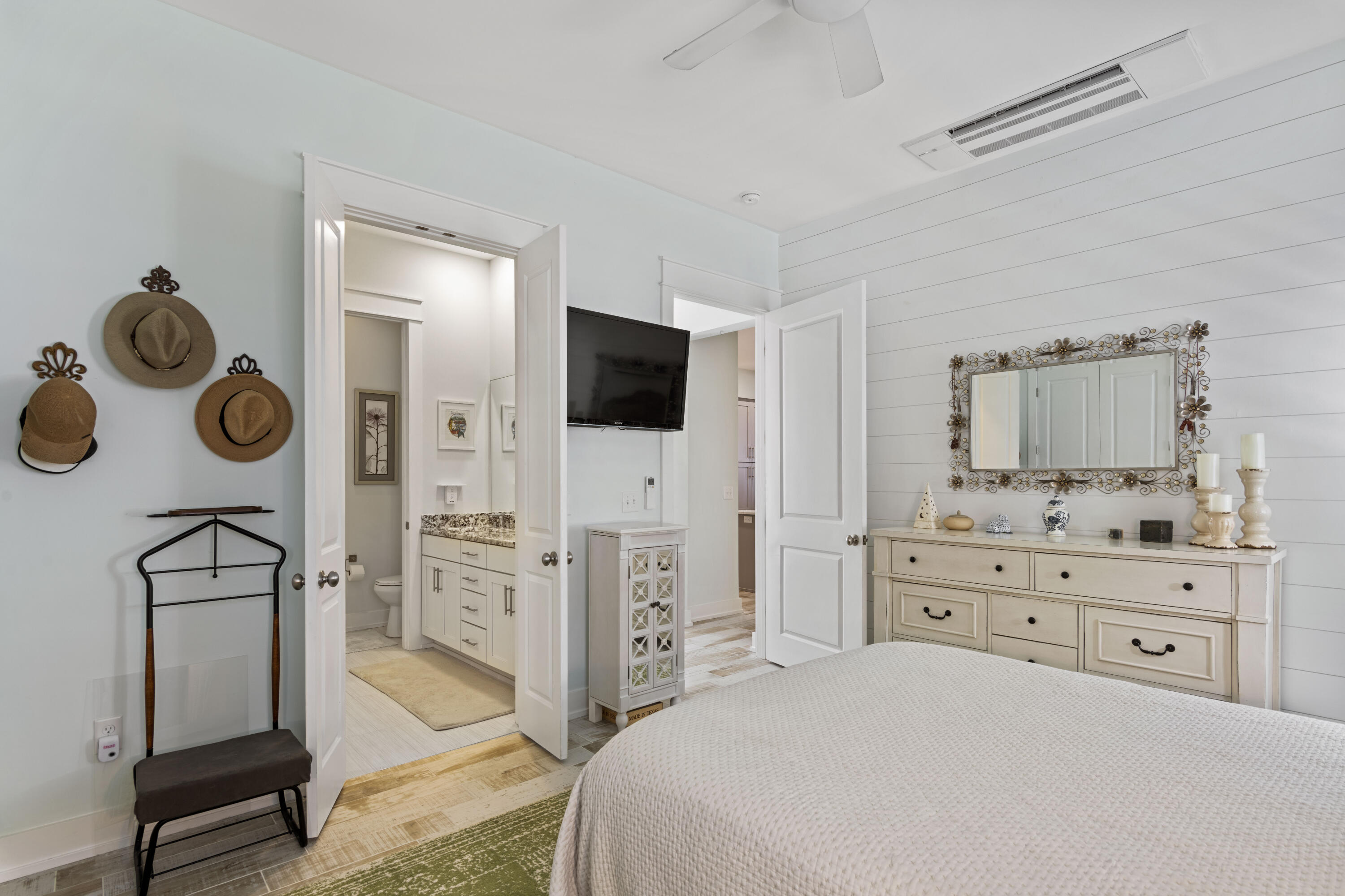 58 Beach View Drive Inlet Beach, FL 32461 - Photo 23 of 47 a bedroom with a dresser and a flat screen tv