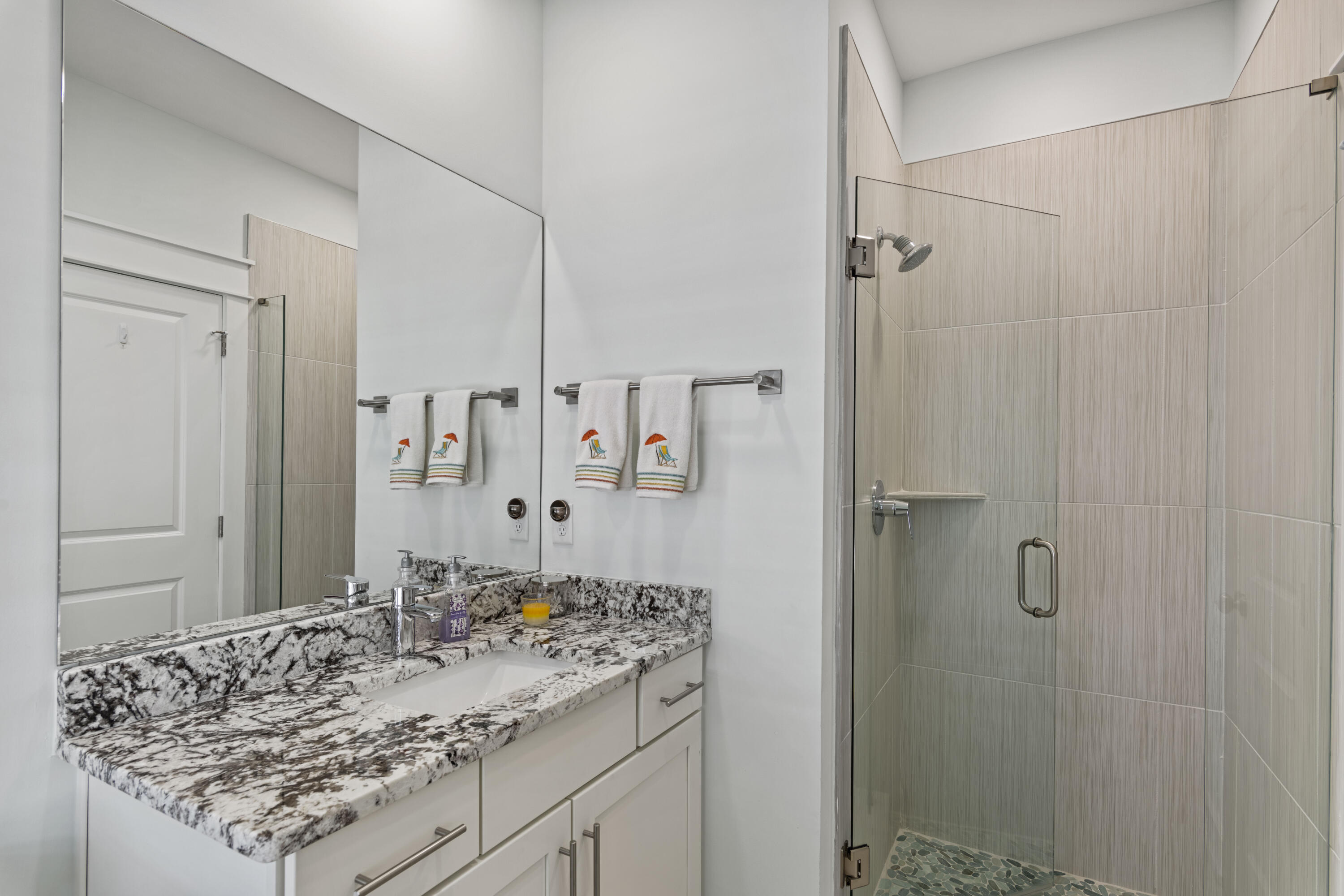 58 Beach View Drive Inlet Beach, FL 32461 - Photo 29 of 47 a bathroom with a granite countertop sink and a mirror