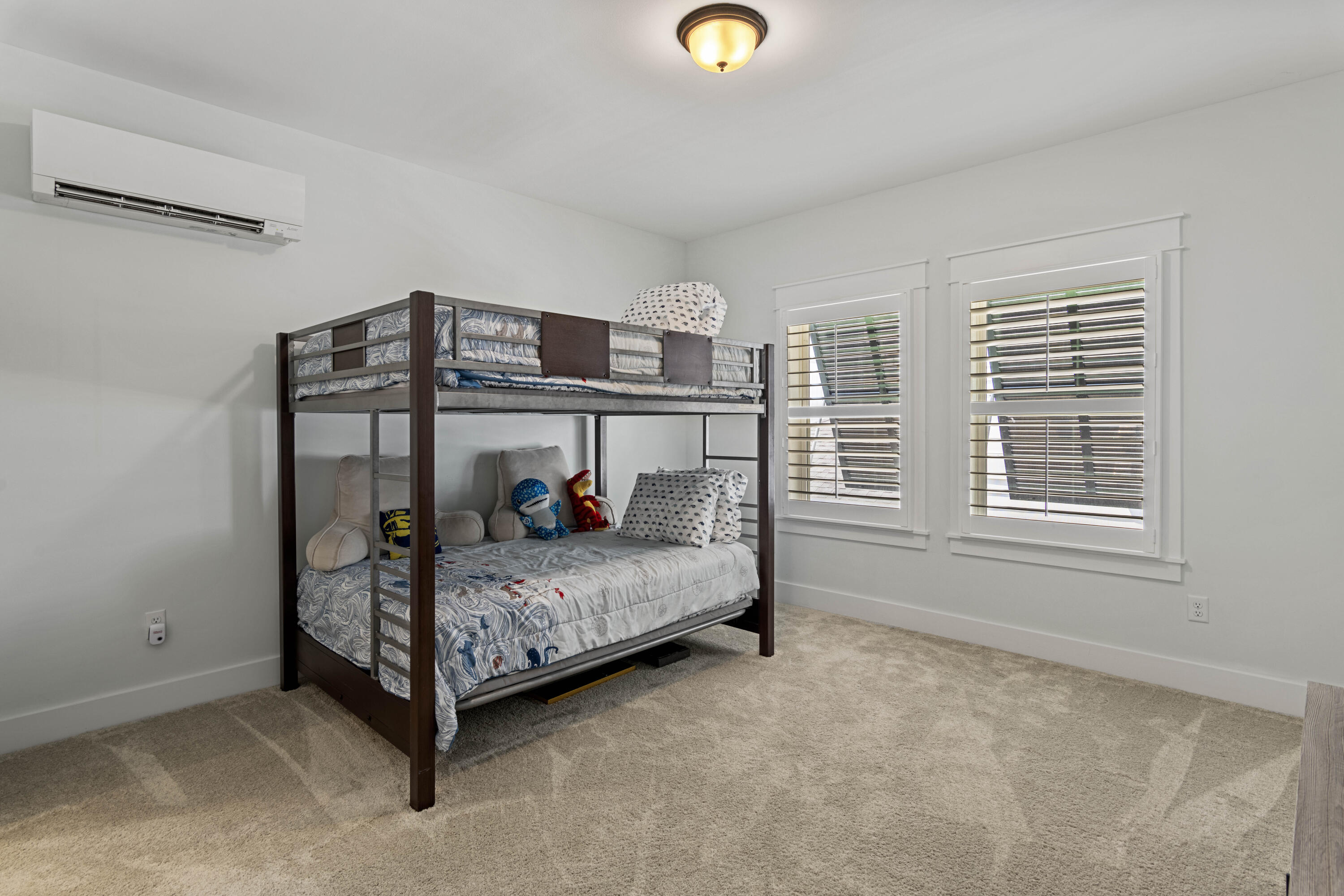 58 Beach View Drive Inlet Beach, FL 32461 - Photo 33 of 47 a bedroom with a bed and a window