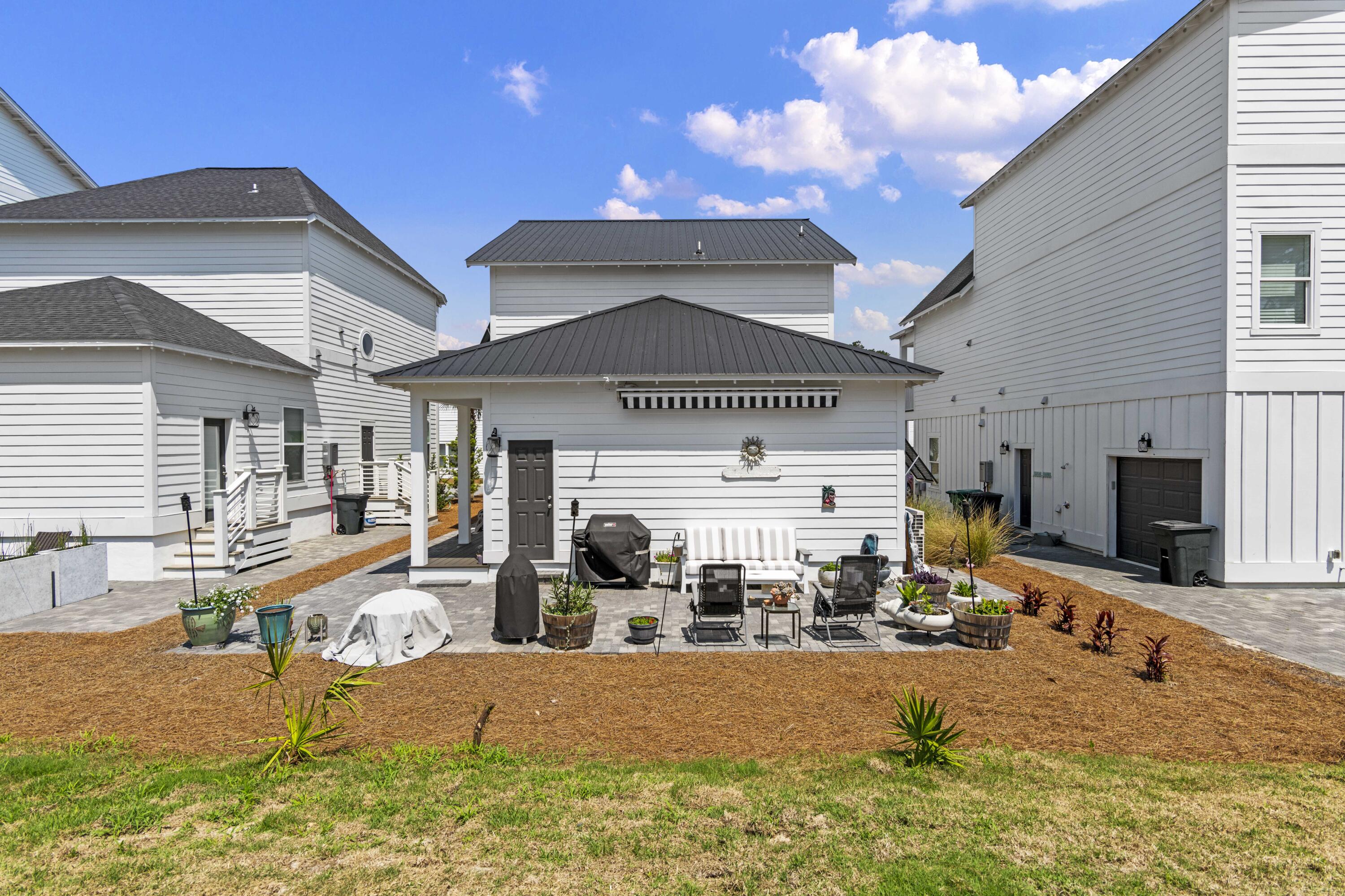 58 Beach View Drive Inlet Beach, FL 32461 - Photo 38 of 47 a view of a house with outdoor kitchen