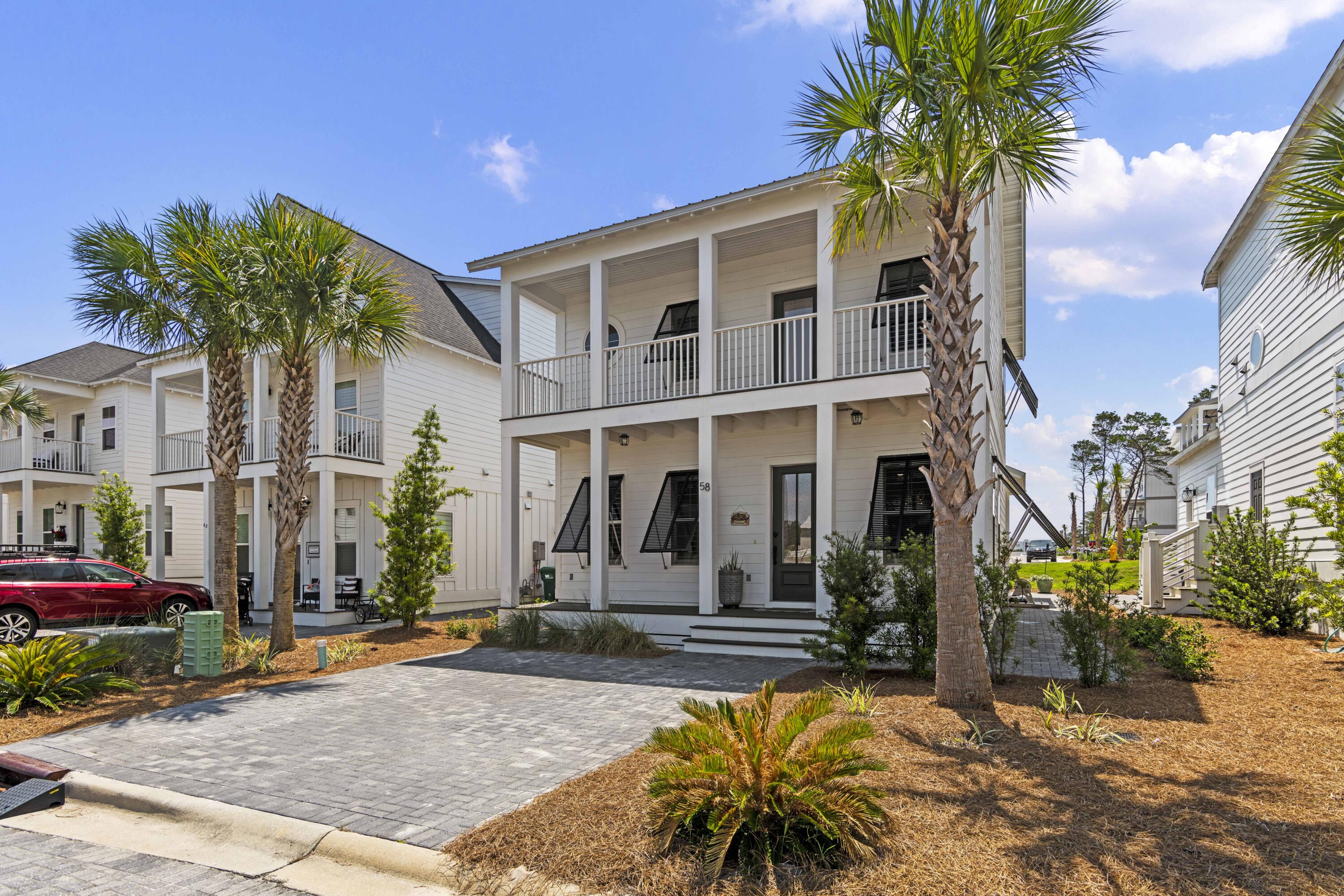 58 Beach View Drive Inlet Beach, FL 32461 - Photo 6 of 47 a front view of a house with a tree