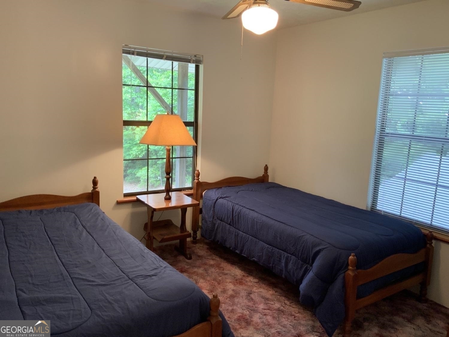 277 Hamilton Road Blairsville, GA 30512 - Photo 11 of 27 a bedroom with a bed and window