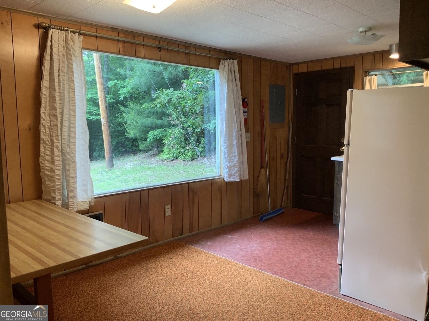 277 Hamilton Road Blairsville, GA 30512 - Photo 15 of 27 a view of an empty room with a window