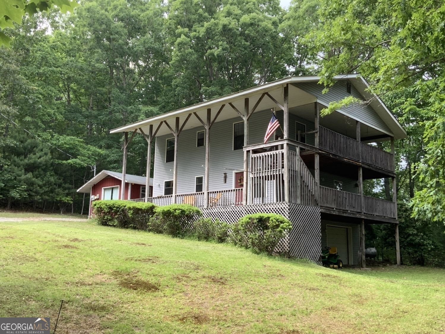 277 Hamilton Road Blairsville, GA 30512 - Photo 2 of 27 a front view of a house with yard and green space