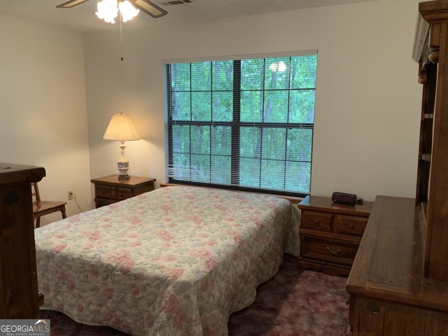 277 Hamilton Road Blairsville, GA 30512 - Photo 9 of 27 a bedroom with a bed and a window