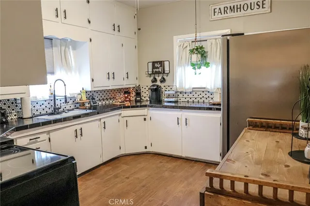 a bedroom with a bed and a chair