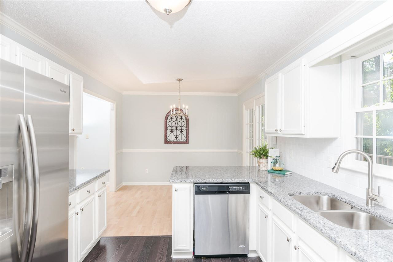 308 Crosspine Drive Raleigh, NC 27603 - Photo 5 of 11 Kitchen opens up to spacious dining area. Kitchen