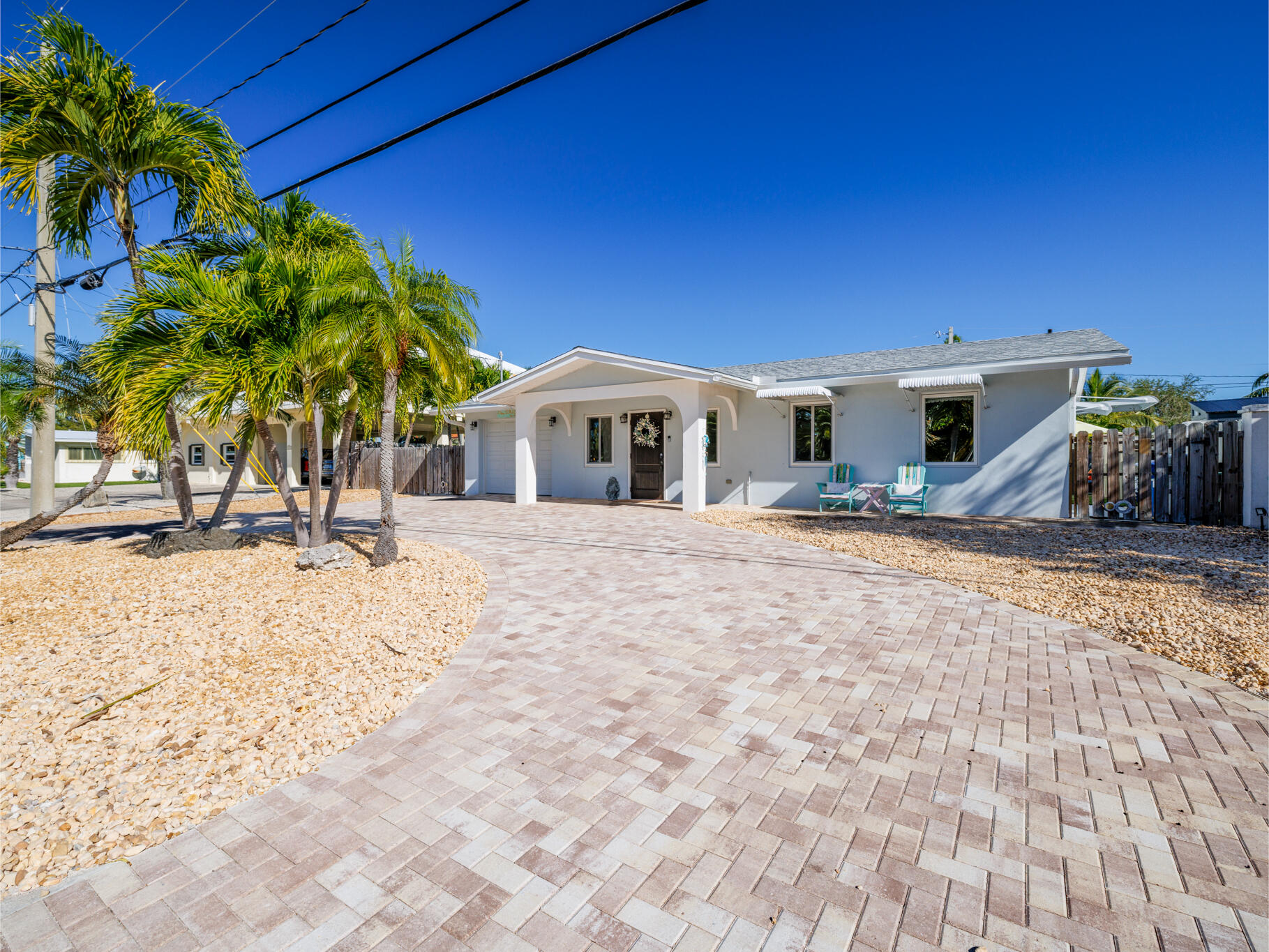 1657 Watson Boulevard Big Pine Key, FL 33043 - Photo 32 of 34 a view of a backyard with a patio