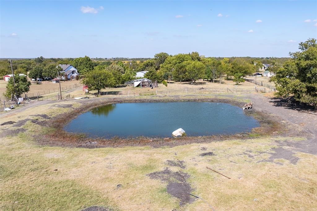 1199 Cedar Lane Kaufman, TX 75142 - Photo 34 of 40 Water view with a tree filled landscape