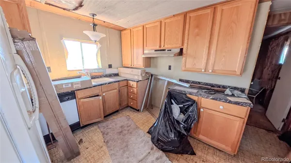 a bathroom with a toilet and a sink