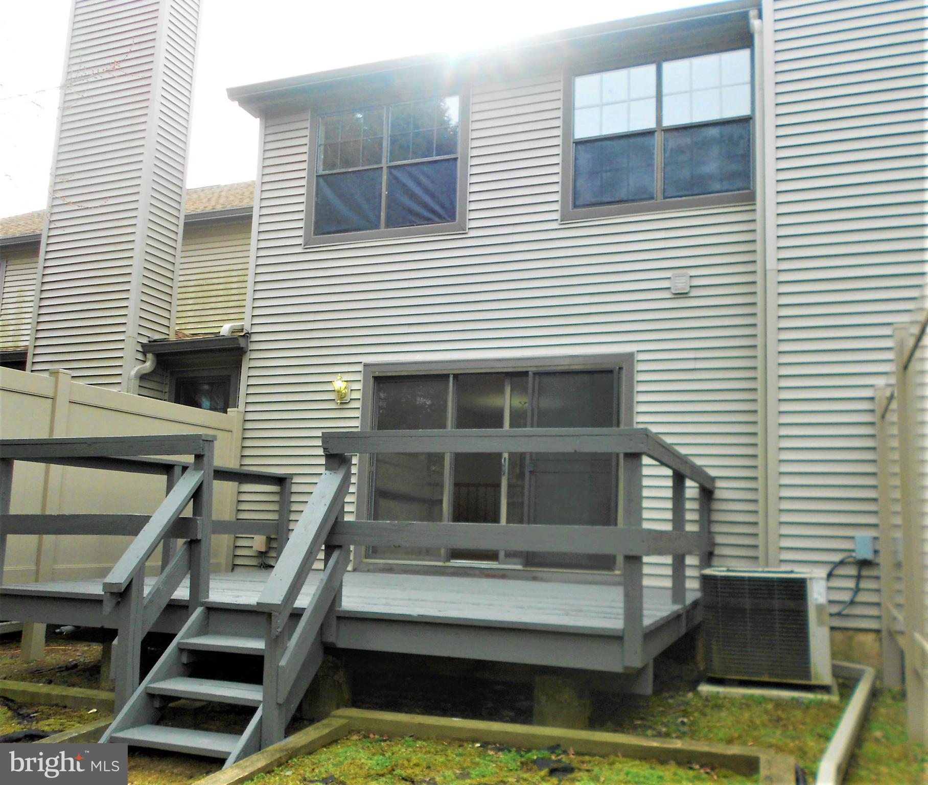 404 Marten Road Princeton, NJ 08540 - Photo 20 of 23 Freshly stained deck overlooking wooded area