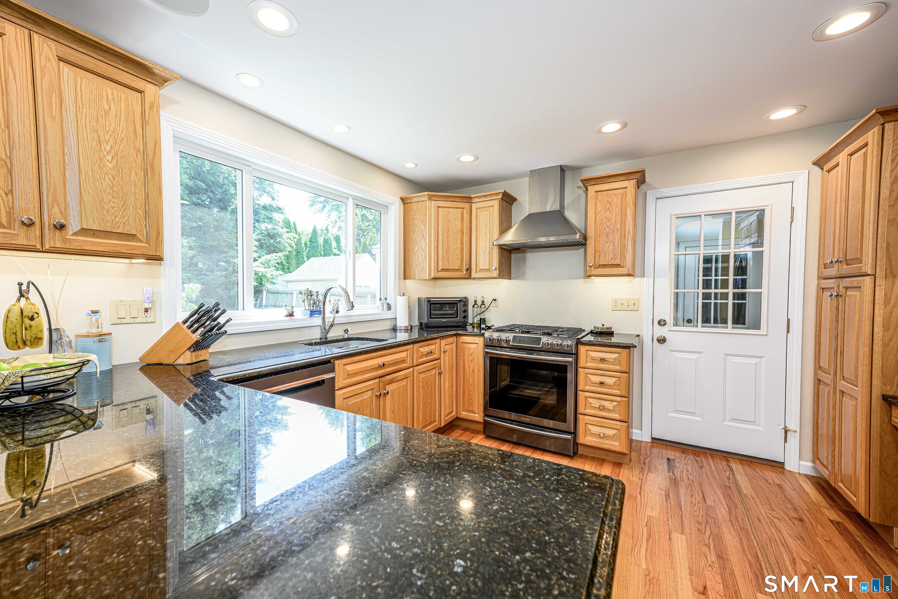 25 Wright Lane Hamden, CT 06517 - Photo 14 of 38 Tastefully updated kitchen with huge window overlooking the backyard.