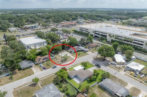 an aerial view of residential house and outdoor space