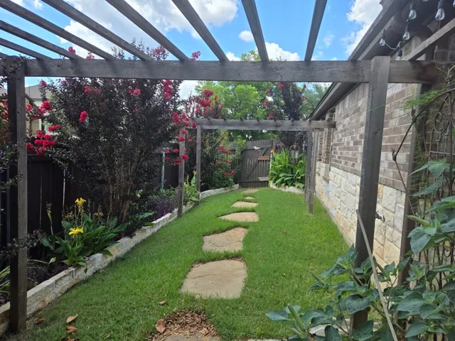 a backyard of a house with garden