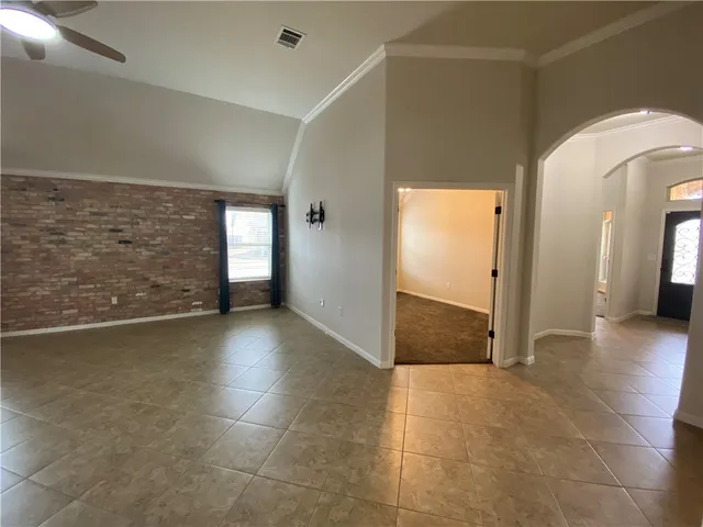 a view of a livingroom with a staircase