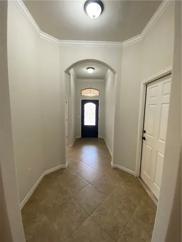 a view of a hallway with a fireplace