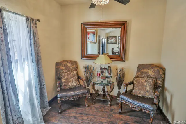 a living room with furniture and a window