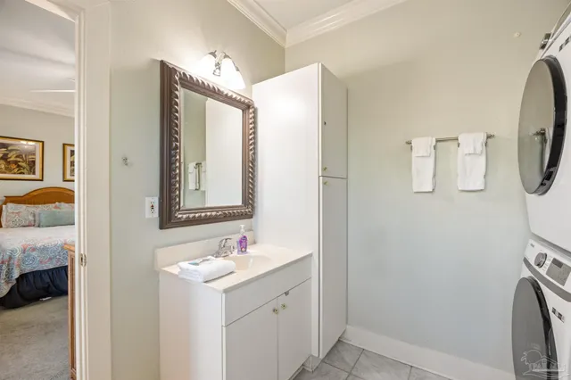 a view of a room with a table and chairs