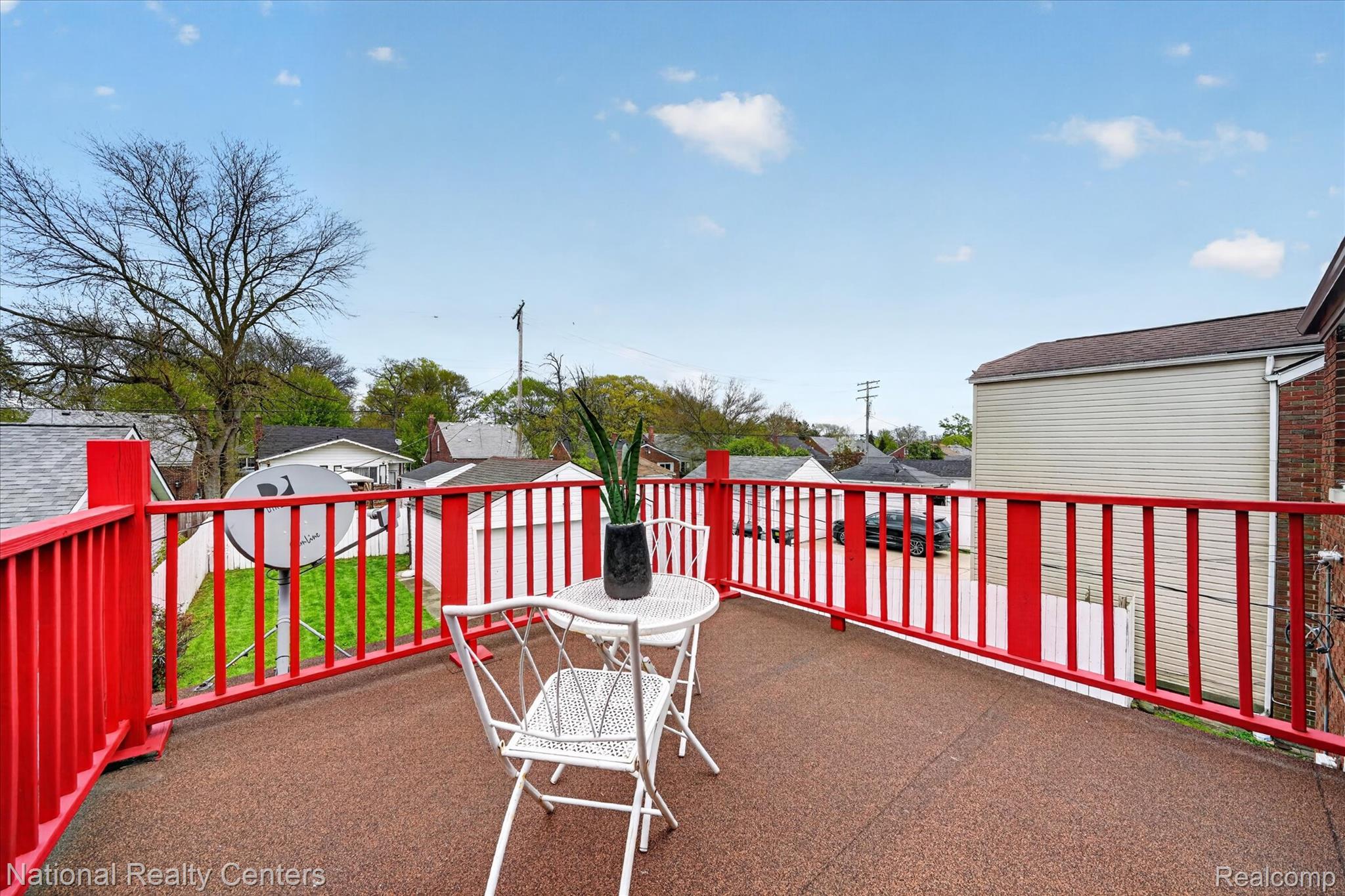 3956 Harvard Road Detroit, MI 48224 - Photo 39 of 44 Patio / terrace with a residential view and a yard