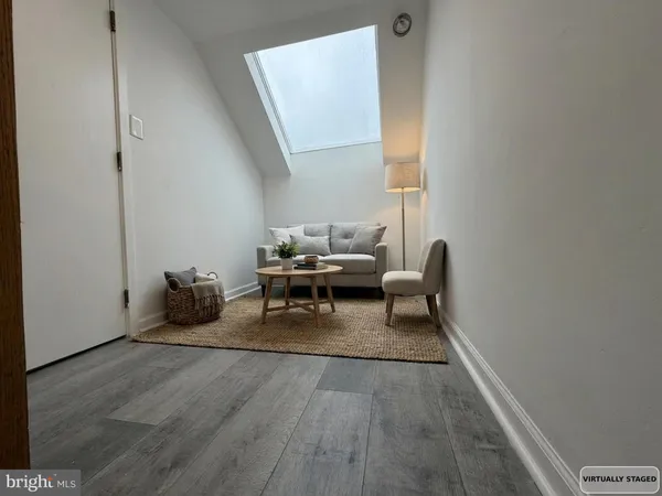 a bedroom with a bed and a view of bathroom