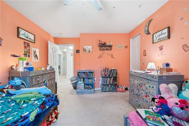 a bed room with a bed and a baby crib