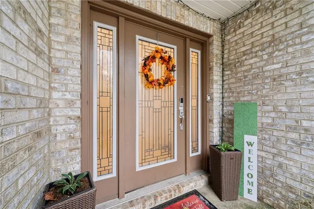 a front view of a house with a entryway