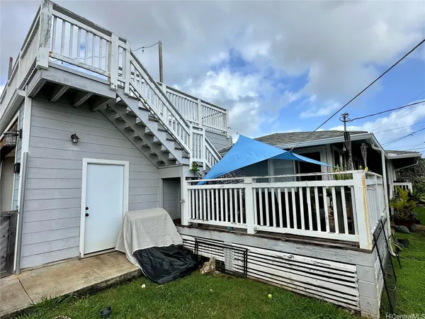 a view of a house with a deck