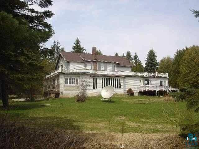 8 Lakewood Road Duluth, MN 55804 - Photo 24 of 30 Back of house with a yard