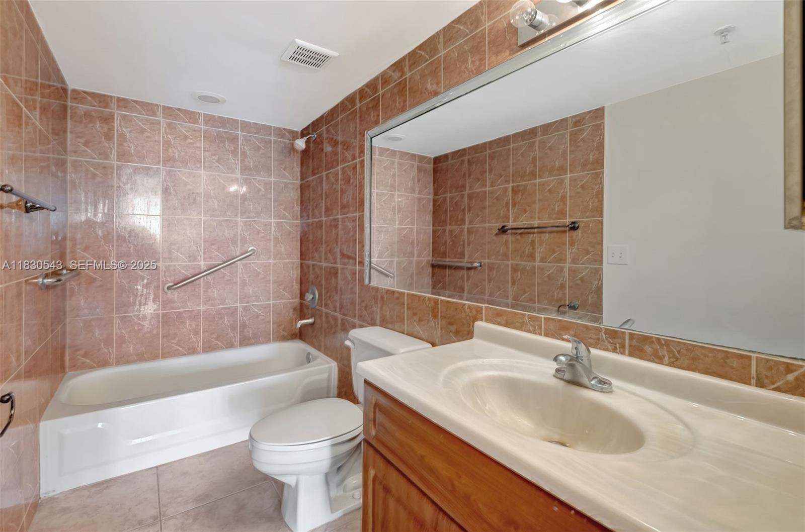 2400 Southwest 3rd Avenue, Unit 506 Miami, FL 33129 - Photo 17 of 28 a bathroom with a sink toilet and shower