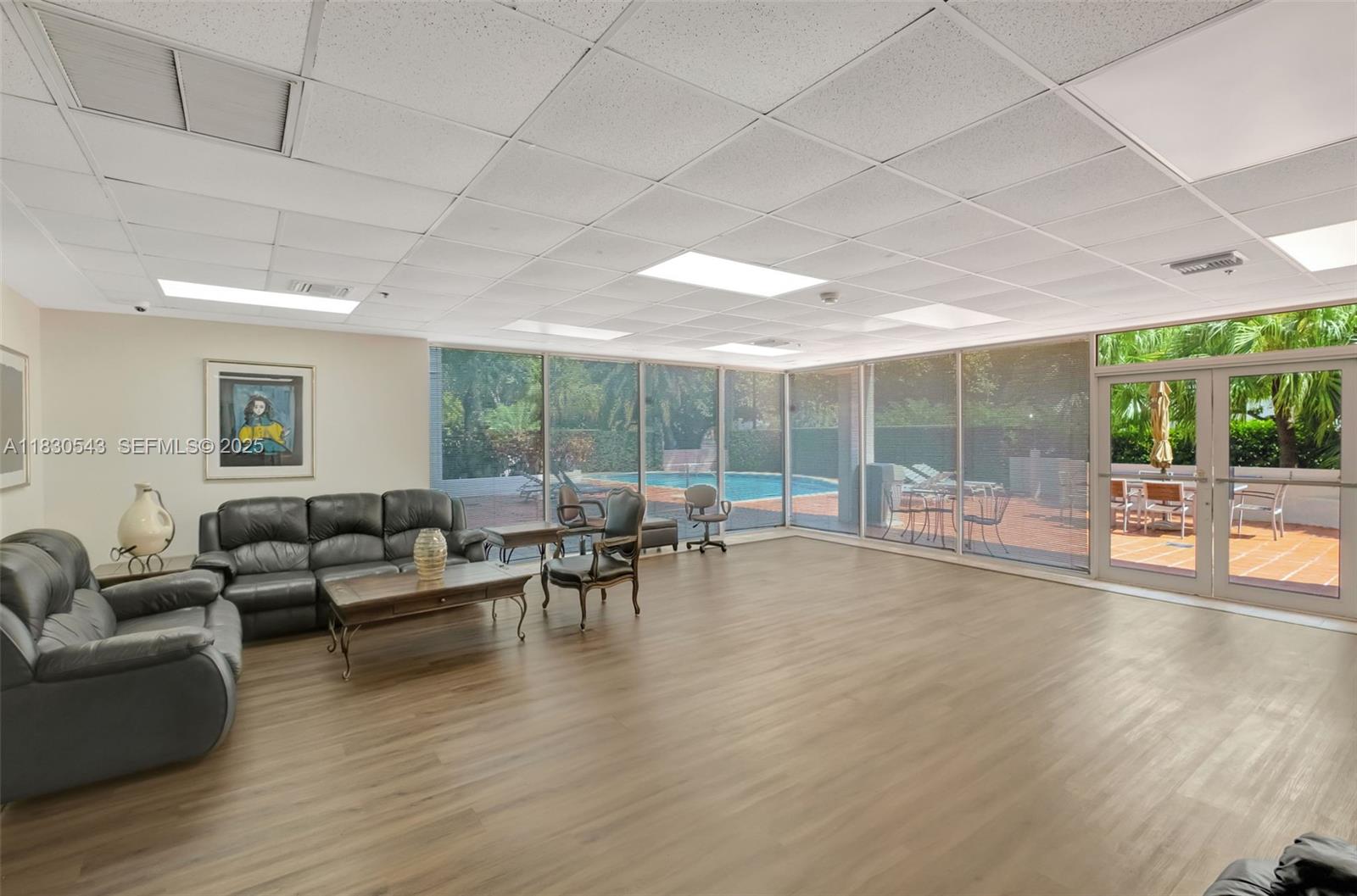 2400 Southwest 3rd Avenue, Unit 506 Miami, FL 33129 - Photo 28 of 28 a living room with furniture and a table