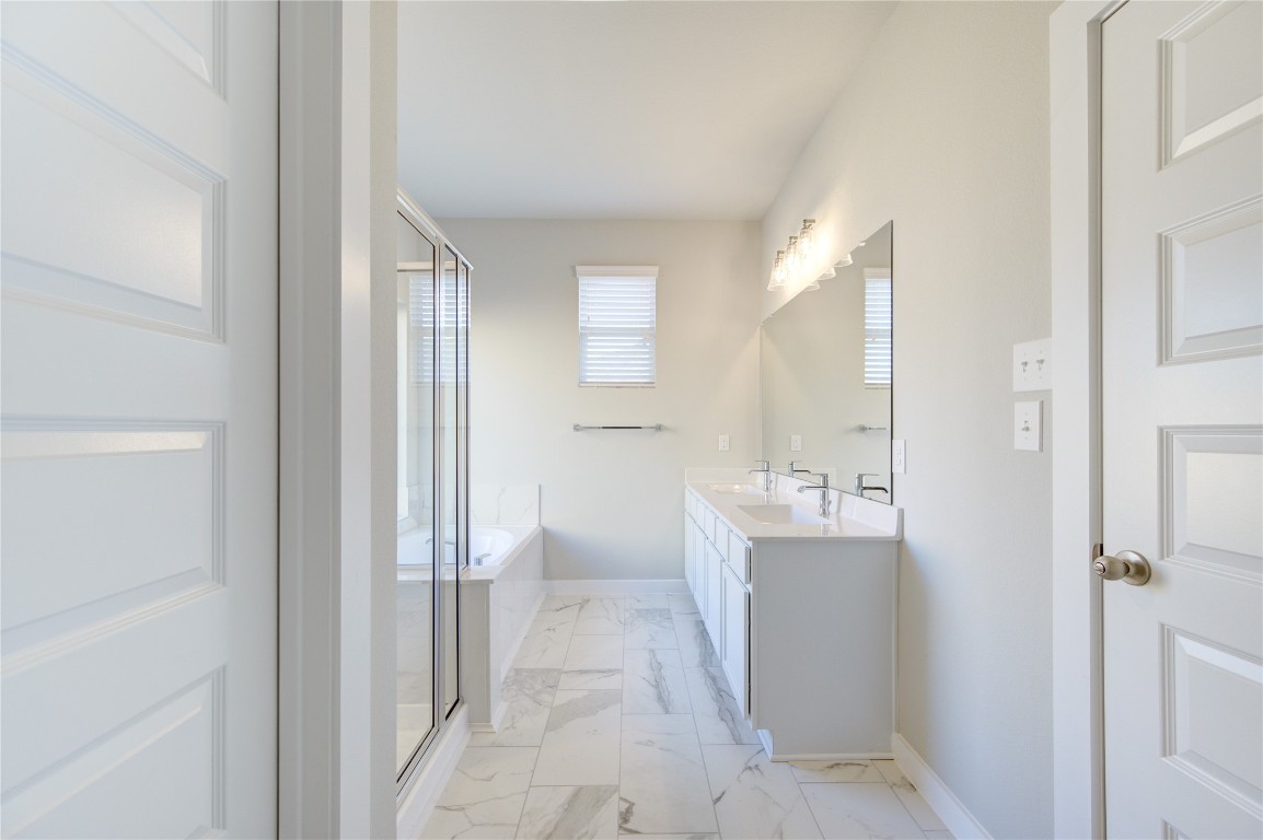 2623 Finley Lane Rosenberg, TX 77471 - Photo 26 of 49 a bathroom with a double vanity sink mirror and shower