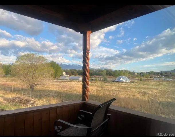 a view of a lake from a balcony