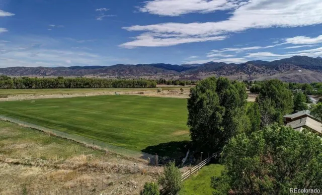 a view of a lake with a mountain in the background