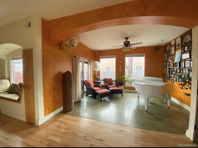 a view of a living room and dining room