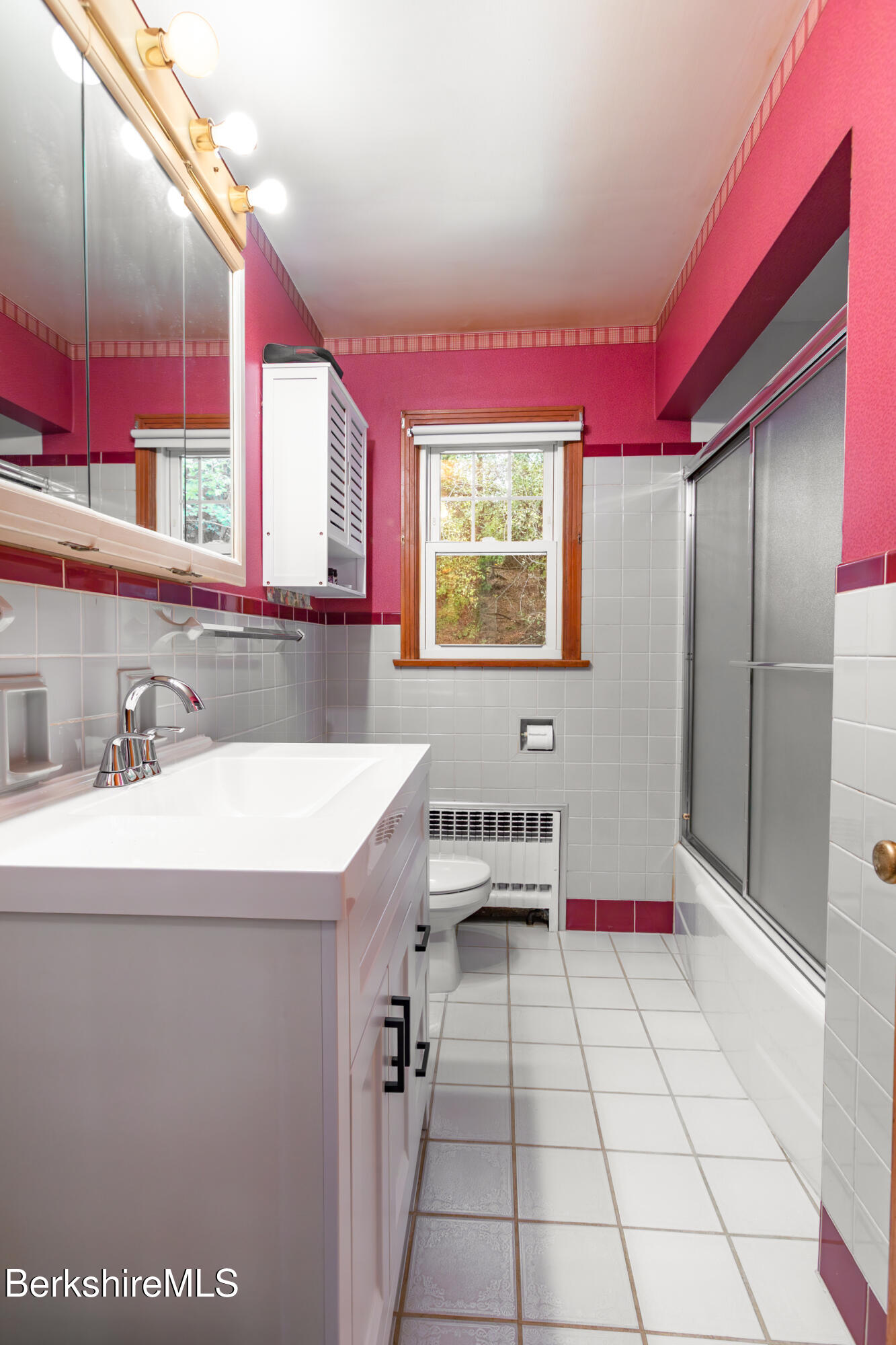 139 Gamwell Avenue Pittsfield, MA 01201 - Photo 12 of 33 a kitchen with a sink a stove and a refrigerator