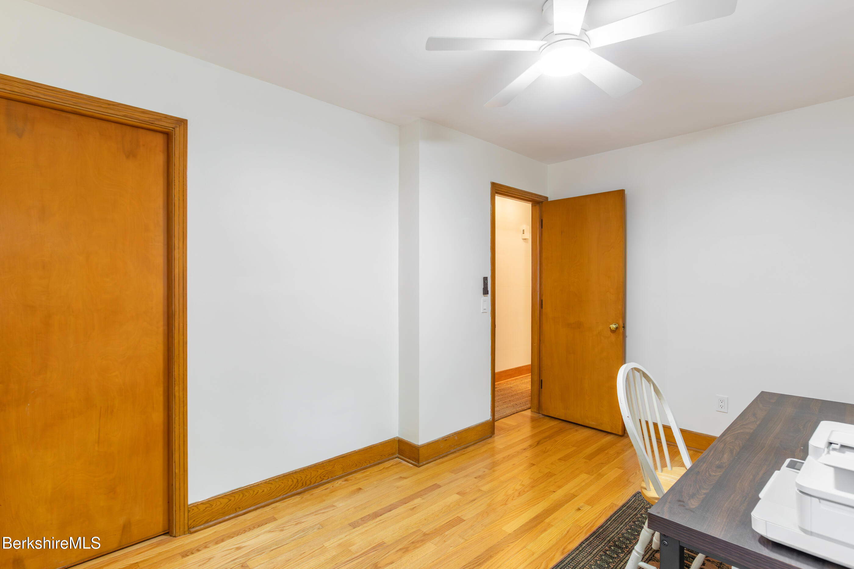 139 Gamwell Avenue Pittsfield, MA 01201 - Photo 14 of 33 a bedroom with a bed and wooden floor
