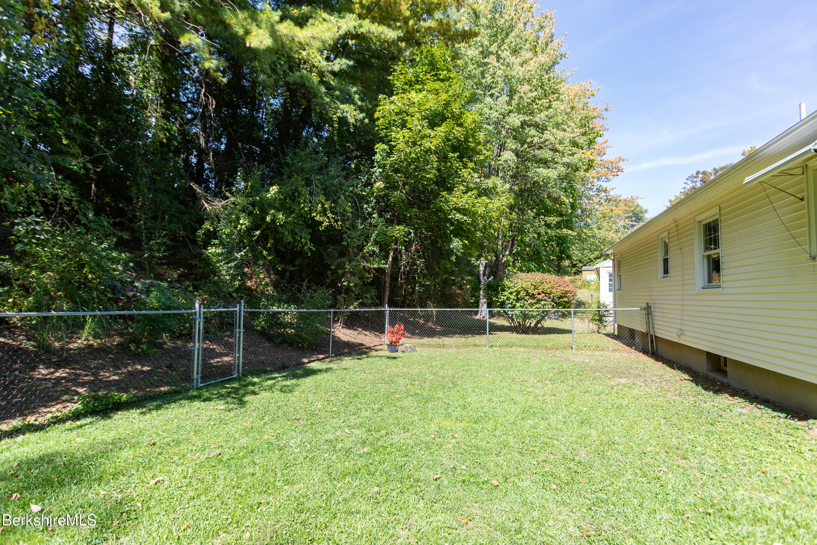 139 Gamwell Avenue Pittsfield, MA 01201 - Photo 24 of 33 a view of a backyard with a park