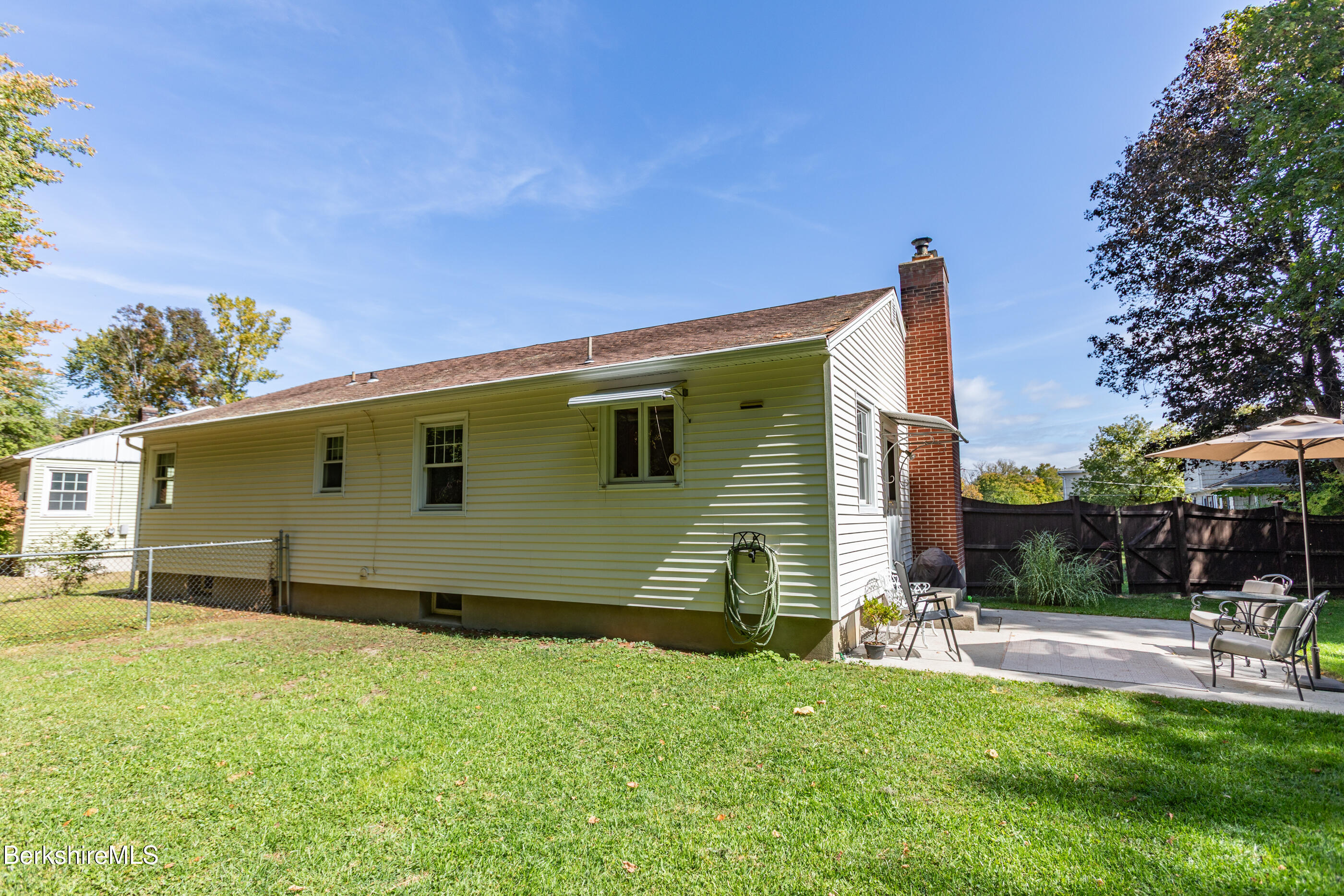139 Gamwell Avenue Pittsfield, MA 01201 - Photo 26 of 33 a backyard of a house with table and chairs