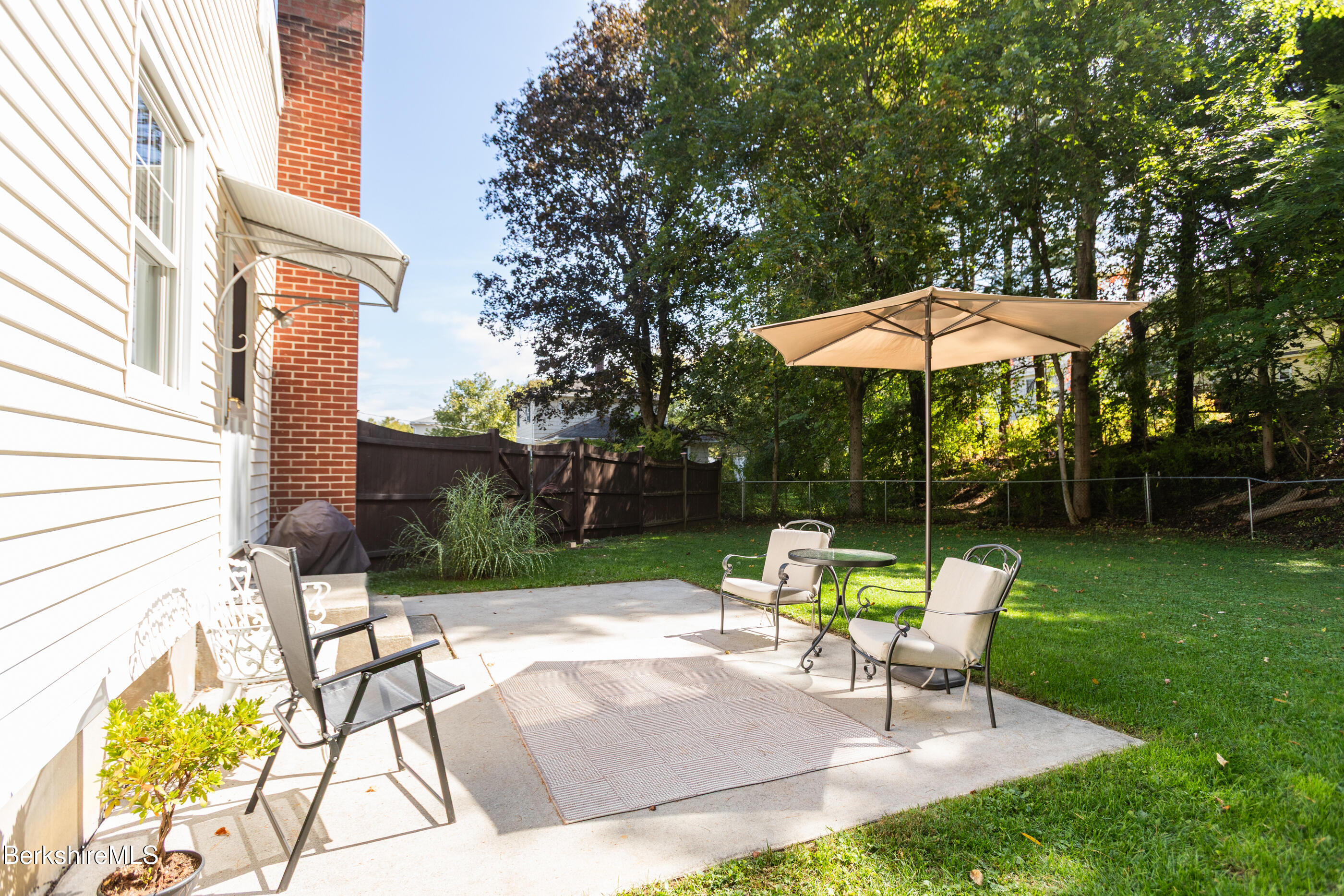 139 Gamwell Avenue Pittsfield, MA 01201 - Photo 28 of 33 a view of a garden with a patio and a garden