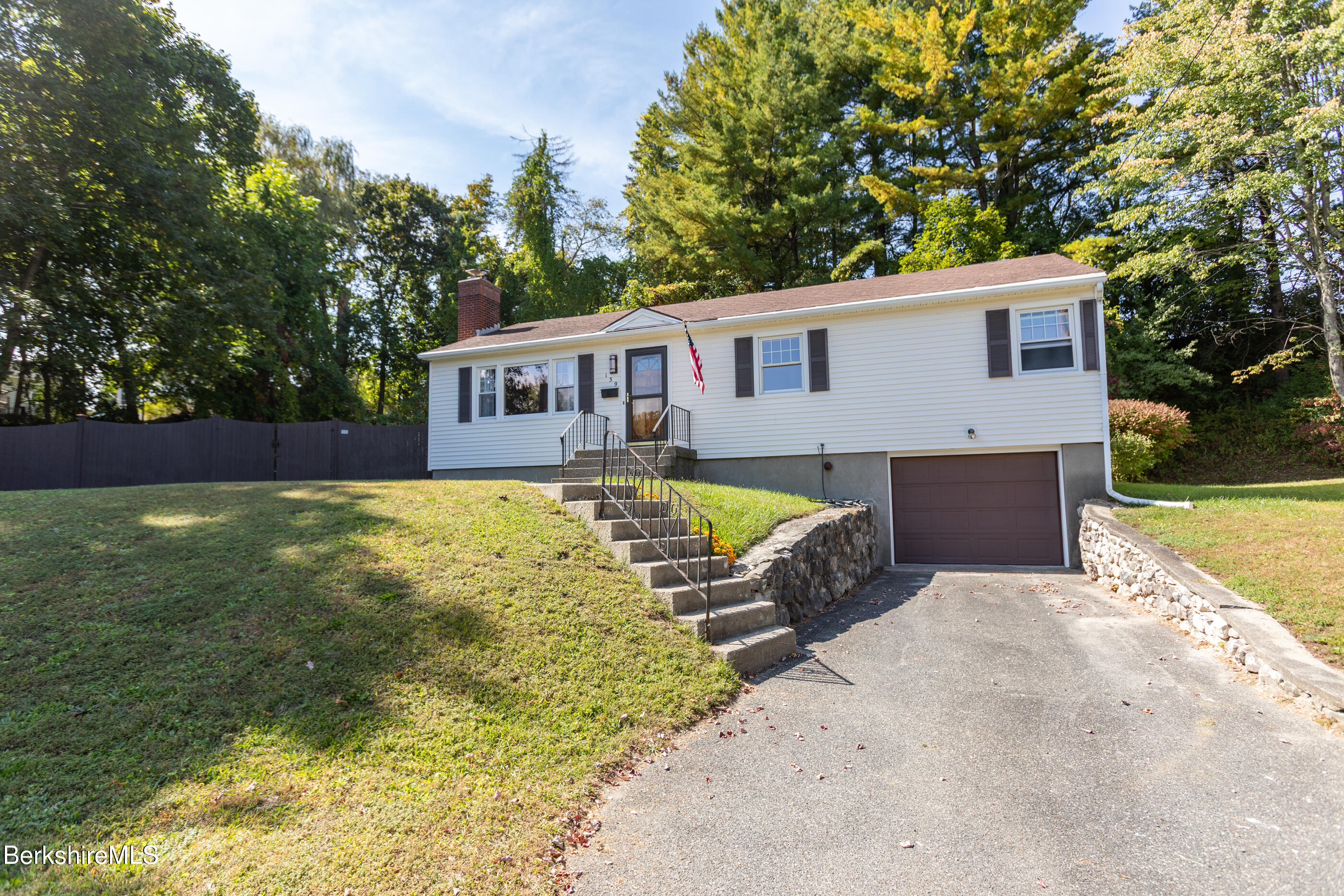 139 Gamwell Avenue Pittsfield, MA 01201 - Photo 32 of 33 a front view of house with yard and trees in the background