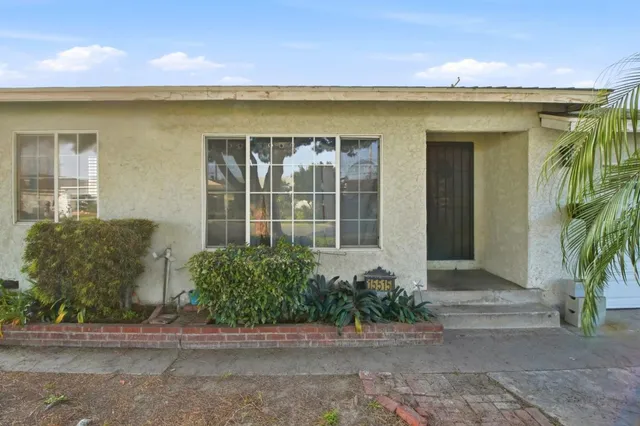a front view of a house having yard
