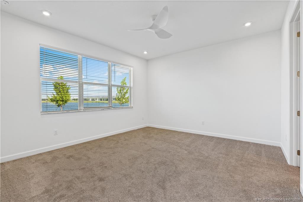 9731 Southwest Indra Way Port St. Lucie, FL 34987 - Photo 15 of 33 Primary Room