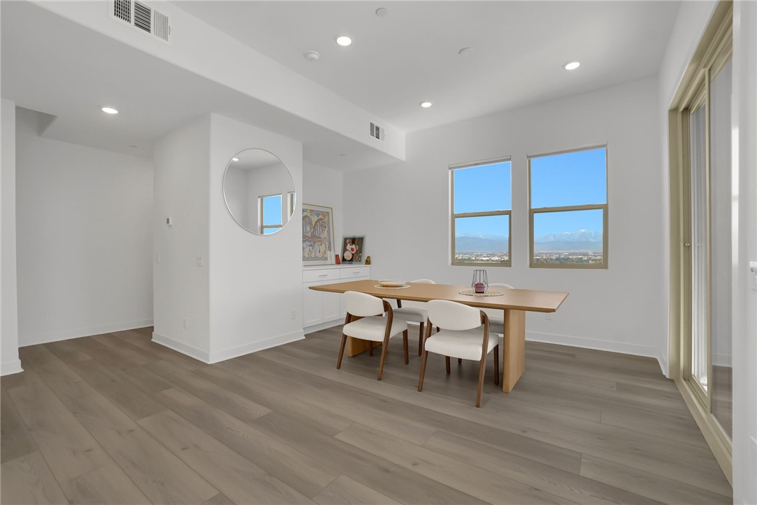 1958 Hollyleaf Terrace Montebello, CA 90640 - Photo 19 of 58 a dining room with a wooden table and chairs